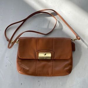 Vintage leather coach clutch with strap in cognac color